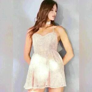 Urban Outfitters-Kimchi Blue Victoria Sweetheart
Shimmer Lace Romper